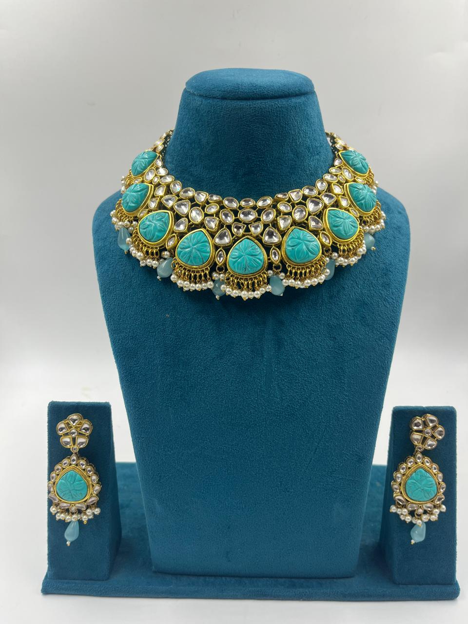 Turquoise Blue Kundan Set with Carving Stones