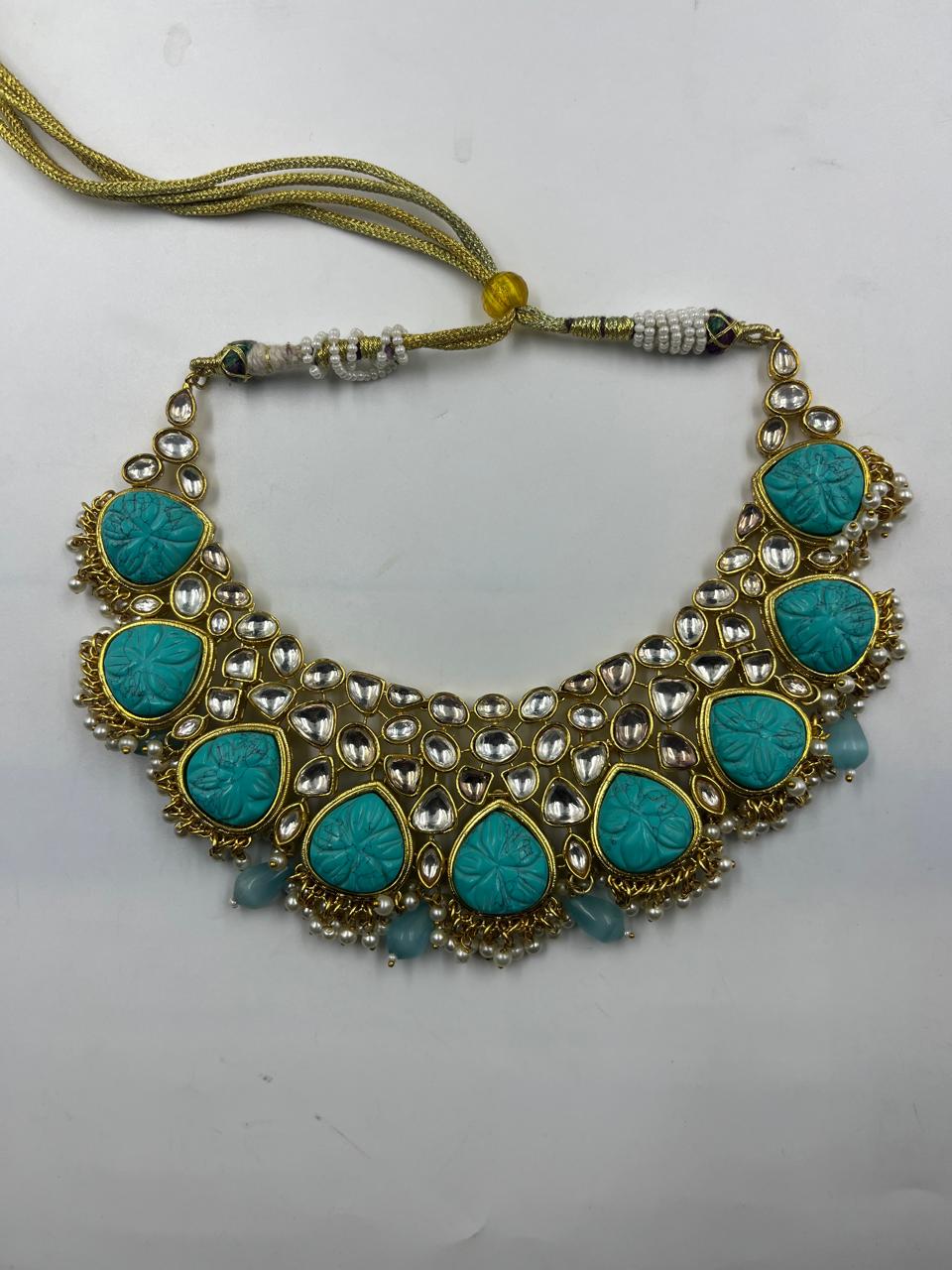 Turquoise Blue Kundan Set with Carving Stones