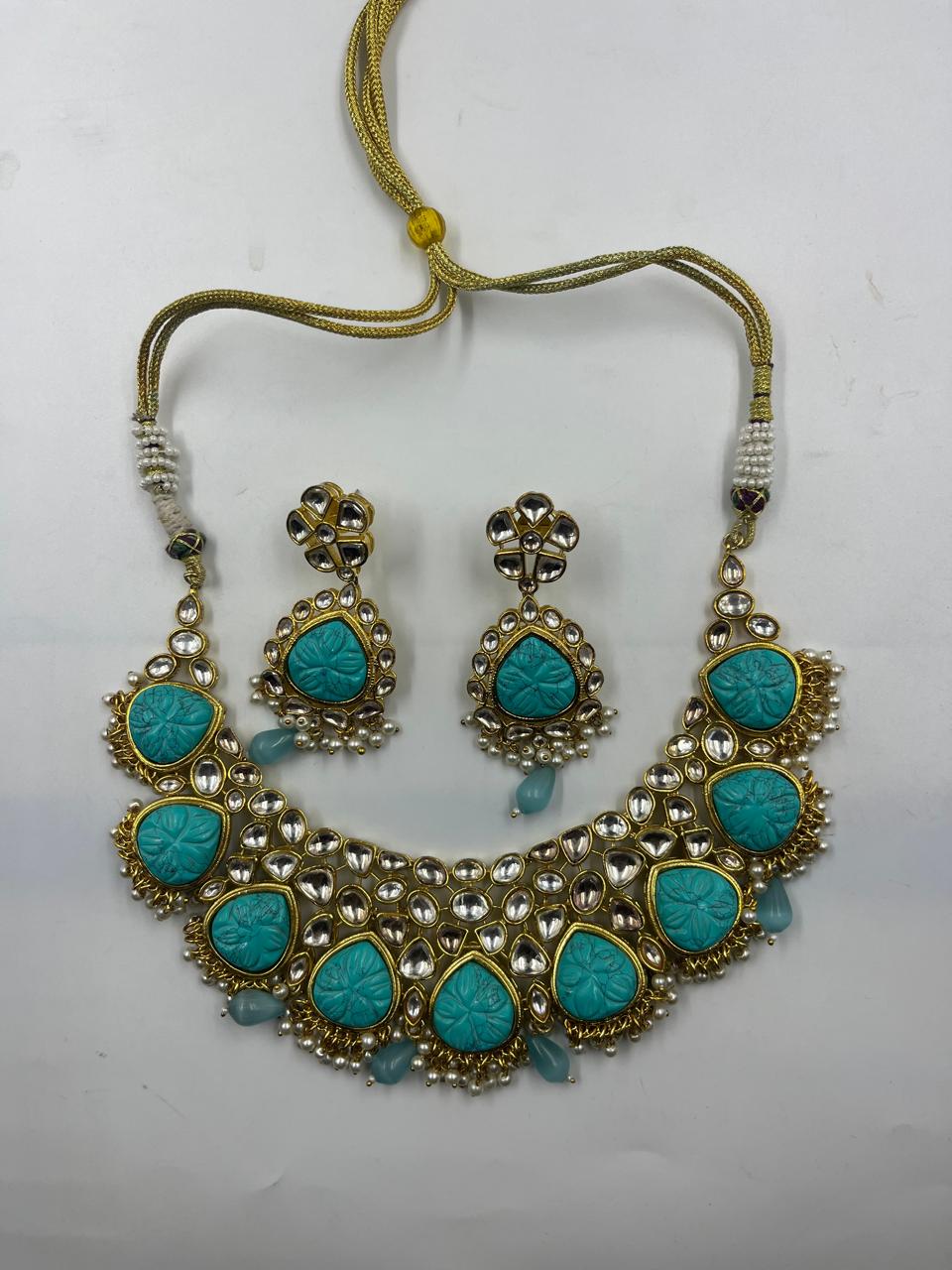 Turquoise Blue Kundan Set with Carving Stones